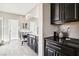 Elegant bathroom with double vanity and built-in coffee station at 1557 Mistywood Ct, Henderson, NV 89014