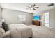 Spacious bedroom with large TV and ensuite bathroom access at 1557 Mistywood Ct, Henderson, NV 89014