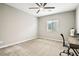 Cozy bedroom with window, desk and chair at 1557 Mistywood Ct, Henderson, NV 89014