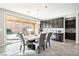 Bright dining area with sliding glass doors leading to the backyard at 1557 Mistywood Ct, Henderson, NV 89014