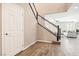 Bright entryway with hardwood floors and staircase at 1557 Mistywood Ct, Henderson, NV 89014