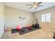 Home gym with elliptical, yoga ball and exercise mat at 1557 Mistywood Ct, Henderson, NV 89014