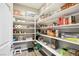 Well-organized pantry with ample shelving for storage at 1557 Mistywood Ct, Henderson, NV 89014