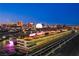 Night view of race track and city skyline at 205 E Harmon Ave # 1012, Las Vegas, NV 89169