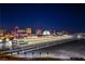 Night view of race track and city skyline at 205 E Harmon Ave # 1012, Las Vegas, NV 89169