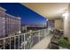 Private balcony with city views at night at 205 E Harmon Ave # 1012, Las Vegas, NV 89169