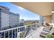 Relaxing balcony featuring city views and seating for two at 205 E Harmon Ave # 1012, Las Vegas, NV 89169