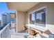 Relaxing balcony with city views and built-in seating at 205 E Harmon Ave # 1012, Las Vegas, NV 89169