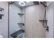 Spa-like bathroom with a glass enclosed shower and built in bench at 205 E Harmon Ave # 1012, Las Vegas, NV 89169