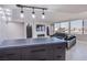 Modern kitchen with dark cabinets and a breakfast bar at 205 E Harmon Ave # 1012, Las Vegas, NV 89169