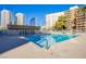 Inviting rectangular swimming pool surrounded by a spacious sundeck at 205 E Harmon Ave # 1012, Las Vegas, NV 89169