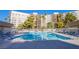 Resort-style swimming pool with comfortable lounge chairs at 205 E Harmon Ave # 1012, Las Vegas, NV 89169