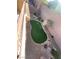 View of backyard with artificial turf and gravel at 2321 Martinique Ave, Henderson, NV 89044