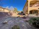 Landscaped backyard with fire pit and gravel at 2321 Martinique Ave, Henderson, NV 89044