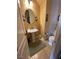 Small powder room with pedestal sink and toilet at 2321 Martinique Ave, Henderson, NV 89044