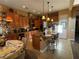 Large kitchen with an island, stainless steel appliances, and wood cabinets at 2321 Martinique Ave, Henderson, NV 89044