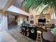 Open living area with high ceilings, a fireplace and a wet bar at 2321 Martinique Ave, Henderson, NV 89044