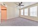 Bright bedroom featuring grey carpet and large windows at 2555 Hampton Rd # 3206, Henderson, NV 89052