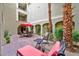 Relaxing courtyard with seating areas and lush landscaping at 2555 Hampton Rd # 3206, Henderson, NV 89052