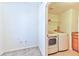 Convenient laundry room with washer, dryer, and extra storage at 2555 Hampton Rd # 3206, Henderson, NV 89052