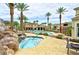 Inviting pool and spa area with lounge chairs and waterfall feature at 2555 Hampton Rd # 3206, Henderson, NV 89052