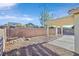 Spacious backyard with covered patio and gravel landscaping at 2687 Hollowvale Ln, Henderson, NV 89052