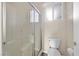 Clean bathroom with shower/tub combo and updated toilet at 2687 Hollowvale Ln, Henderson, NV 89052