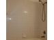 Bathroom with shower and tiled walls at 2725 S Nellis Blvd # 1140, Las Vegas, NV 89121