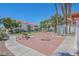 Courtyard with benches, lawn, and shuffleboard at 2725 S Nellis Blvd # 1140, Las Vegas, NV 89121