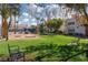 Green lawn with benches, bocce ball, and picnic tables at 2725 S Nellis Blvd # 1140, Las Vegas, NV 89121