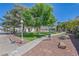 Landscaped green space with walking paths and mature trees at 2725 S Nellis Blvd # 1140, Las Vegas, NV 89121