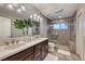 Modern bathroom with double vanity and walk-in shower at 2908 Bryant Ave, Las Vegas, NV 89102