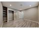 Bedroom with mirrored closet and wood flooring at 2908 Bryant Ave, Las Vegas, NV 89102