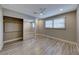 Bedroom with mirrored closet and window coverings at 2908 Bryant Ave, Las Vegas, NV 89102