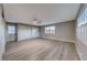 Bright bedroom featuring wood-look floors and multiple closets at 2908 Bryant Ave, Las Vegas, NV 89102