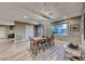 Modern dining room with wood table and metal chairs, hardwood floors at 2908 Bryant Ave, Las Vegas, NV 89102