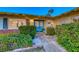 Inviting front entrance with blue double doors and landscaping at 2908 Bryant Ave, Las Vegas, NV 89102