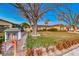 Cute ranch home with a little free library and manicured lawn at 2908 Bryant Ave, Las Vegas, NV 89102