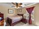 Cozy bedroom with double bed and wood furniture at 3028 Gannon Ridge Ave, North Las Vegas, NV 89081