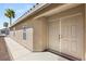 Tan colored front door and walkway to home at 3028 Gannon Ridge Ave, North Las Vegas, NV 89081