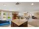 Open concept kitchen with island overlooking living room and backyard at 3028 Gannon Ridge Ave, North Las Vegas, NV 89081