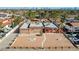 Aerial view of a large house with a spacious yard, and a city view in the background at 3070 Mann St, Las Vegas, NV 89146