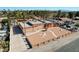 Aerial view showing home's layout and landscaping, with city skyline in background at 3070 Mann St, Las Vegas, NV 89146