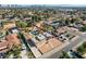 Aerial view of property with large backyard, pool, and city views in background at 3070 Mann St, Las Vegas, NV 89146