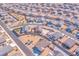 Aerial view of a residential neighborhood with houses and roads at 3614 E Routt Way, Pahrump, NV 89061