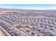 Aerial view of a residential neighborhood with houses and roads at 3614 E Routt Way, Pahrump, NV 89061