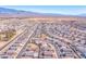 Aerial view of a residential neighborhood with houses and roads at 3614 E Routt Way, Pahrump, NV 89061