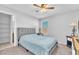 Cozy bedroom with a double bed and ceiling fan at 3614 E Routt Way, Pahrump, NV 89061