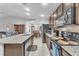 Kitchen with stainless steel appliances and granite countertops at 3614 E Routt Way, Pahrump, NV 89061