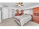 Main bedroom with large closet and ceiling fan at 3614 E Routt Way, Pahrump, NV 89061